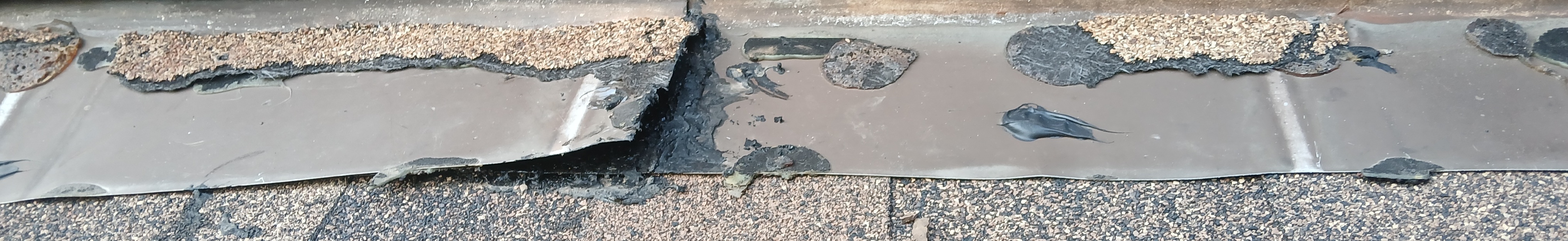 Re-used damaged roofing materials and improper installation by Summit Roofing